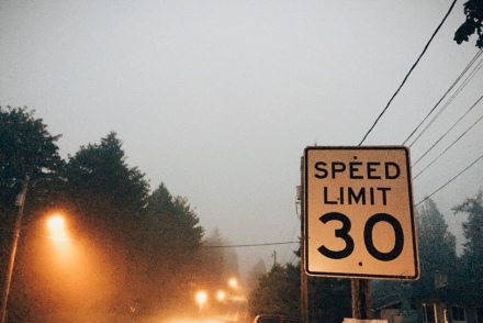 speed limit sign in the fog